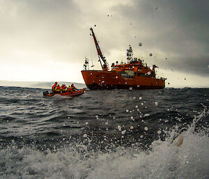 Approaching the ship in an inflatable boat in Kista Strait near Mawson
