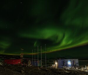 An aurora with a band of violet and green over Mawson station