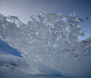 Ice that has been swept into a sculpture by the wind