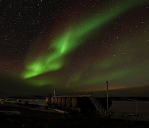 A bolt of green above the fuel tanks