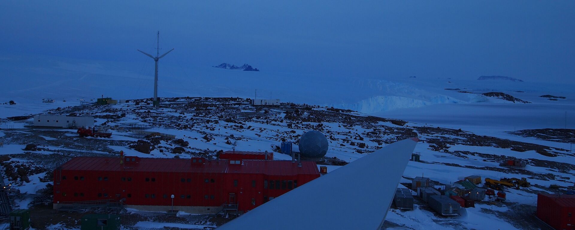 A view from a turbine of a snow covered station and plateau