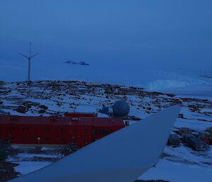 A view from a turbine of a snow covered station and plateau