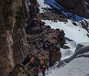 2 climbers on ropes closer to the peak of Mt Hordern