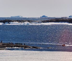 An IRB bearing expeditioners heads to shore