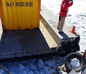 The front of the Barge and the wharf’s edge meet