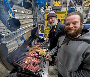 2 men at a BBQ