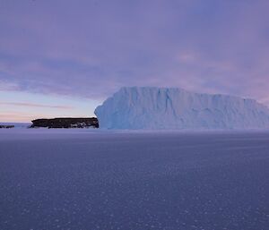 An iceberg locked in the sea ice in the recreational area