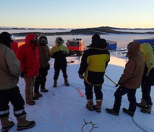 The training group being talked through the set upr equired to pull a Hagg out of the sea