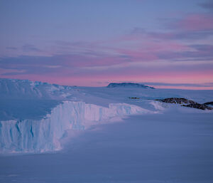 A sunset sky over West Bay and Casey Range