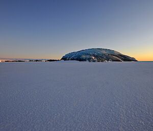 Jade iceberg in the frozen ocean