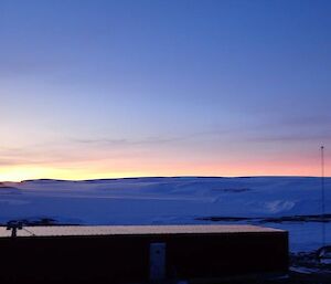 A sunrise over station