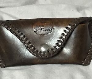 A handworked leather glasses case