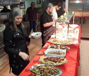 A table laid out with Chinese food.