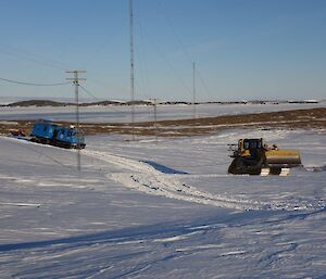 Blue Hägg being towed by the bulldozer