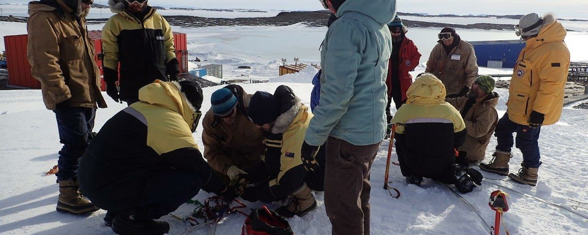 A group of people build a hauling system