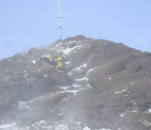 Two men on a mountain in a snowstorm