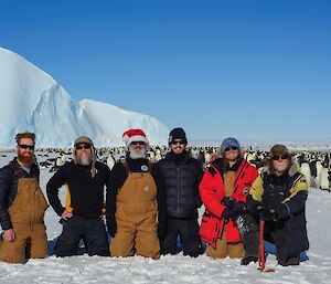 A group of people at Auster penguin colony