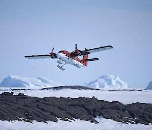 The Twin Otter flies over West Arm