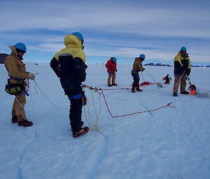 A group of people ready to use their technical rope system