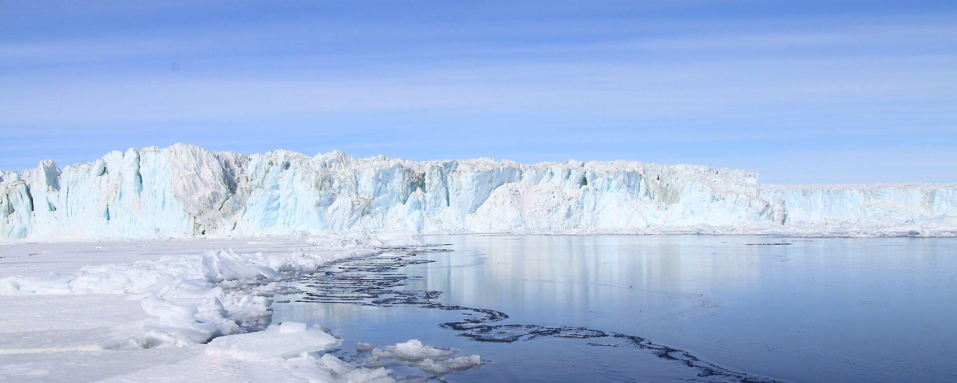 Ice cliffs surrounding the water