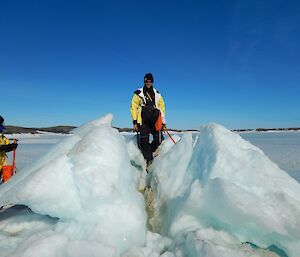 Christian standing on a triangle of uplifted sea ice.