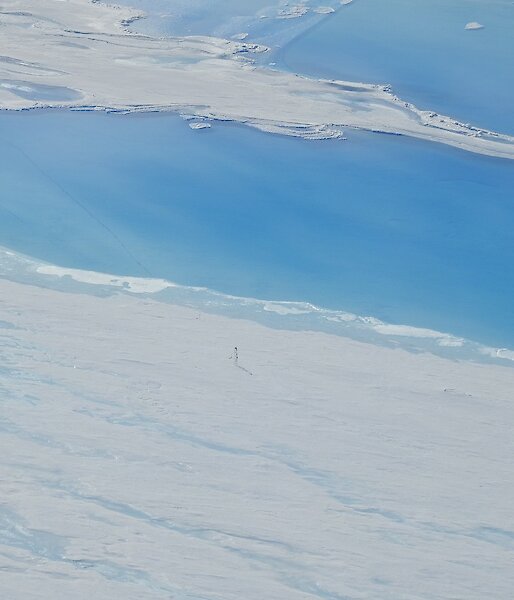 Aerial photo showing a lake monitoring tower is now standing right at the lake’s edge on the Sørsdal Glacier.