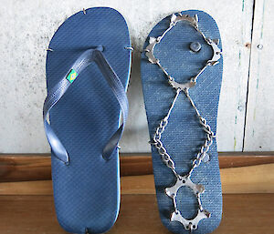 A pair of thongs with snow chains.