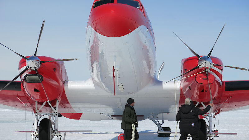 A ski-equipped Basler operated by the Chinese Antarctic program picks the team up from fast ice off Davis.