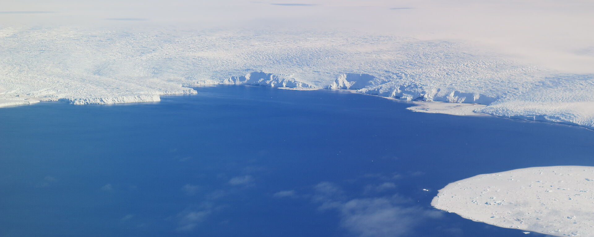 Aerial view of the coastal Antarctic icescape.