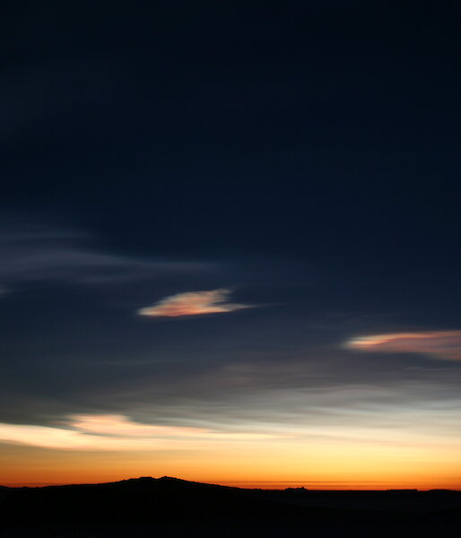 Multicoloured clouds at fading light during sunset