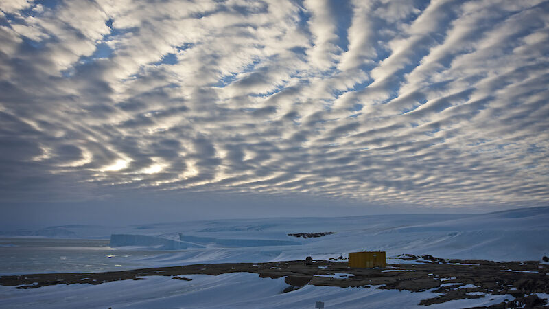 Cloud formations in the sky over building