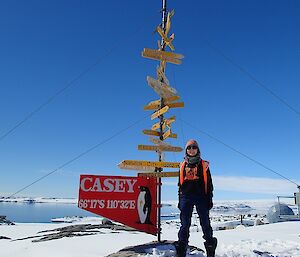 Mana stands in front of Casey sign