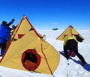 Expeditioners set up a polar pyramid tent to sleep in.