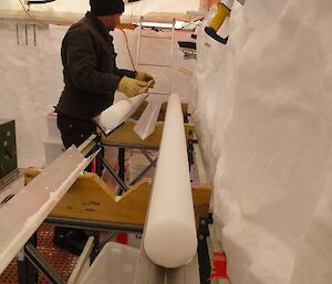 Dr Mark Curran measures the length of an ice core