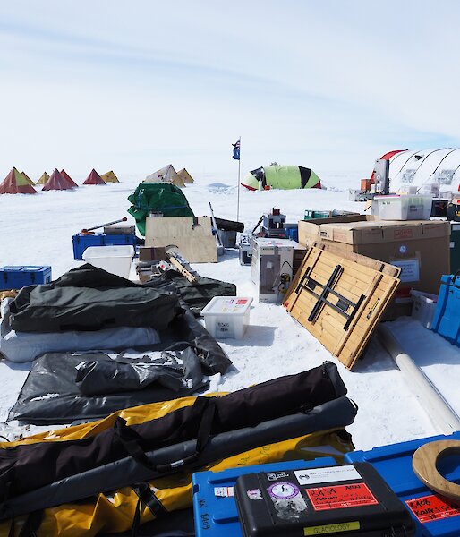 A collection of equipment packed into bags and boxes.