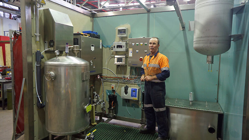 Welder, Stuart Norris, assists with the construction of the advanced treatment plant at the Australian Antarctic Division.