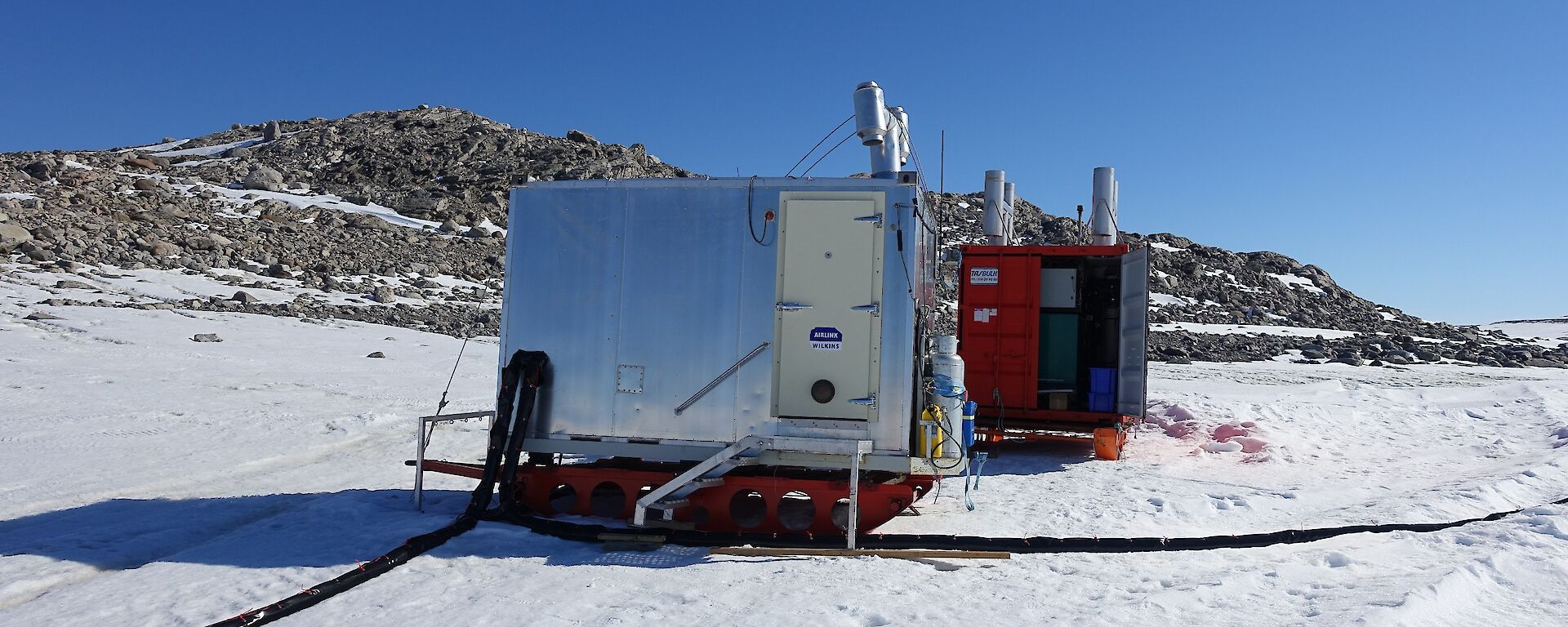 A silver caravan known as the “Silver Chalet” houses the sensor system, data logging and communications equipment on the sea ice