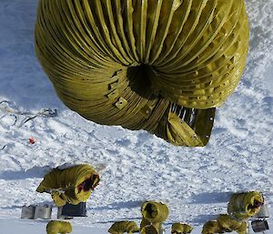 The yellow ducting dismantled into its original 10m long sections and tied up on the sea ice, ready to be transported back to station