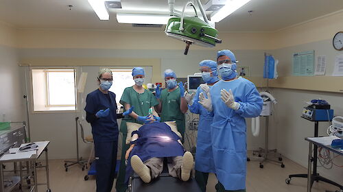 Group of medical assistants and doctor in surgery