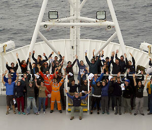 The scientists, artists and support staff of the ‘Heard Earth-Ocean-Biosphere Interactions’ voyage. Voyage Chief Scientist Professor Mike Coffin is front and centre on the steps. Associate Professor Andrew Bowie is in the back row, fourth from the right.