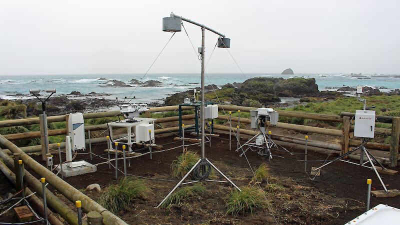 The atmospheric instruments deployed on Macquarie Island include a ceilometer, microwave radiometer and various broadband radiometers provided by the US Department of Energy’s Atmospheric Radiation Measurement program, along with the Bureau of Meteorology’s cloud radar (partially visible at the lower right).