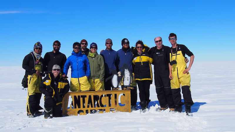 Most of the fast-ice team at the Antarctic Circle.