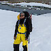 Dr Nick Gales with a pack in the field near Casey research station.