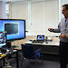 Dr Jeff Ayton and Dr Trudi Disney (Royal Hobart Hospital Specialist Anaesthetist) use telemedicine to demonstrate and remotely supervise a procedure conducted by a trained lay surgical assistant, being undertaken in real time at an Antarctic station some 4000km away. The patient’s vital signs are being monitored in real time via another screen on the right.