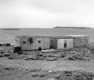 Three small buildings from the original Davis station in 1957.