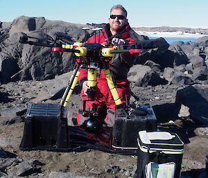 Dean prepares the Matrice 600 pro drone (‘The Kraken’) for a flight, with Wilson attached by a gimbal. Yellow foam on the drone’s legs aims to keep the drone afloat if the worst happens.