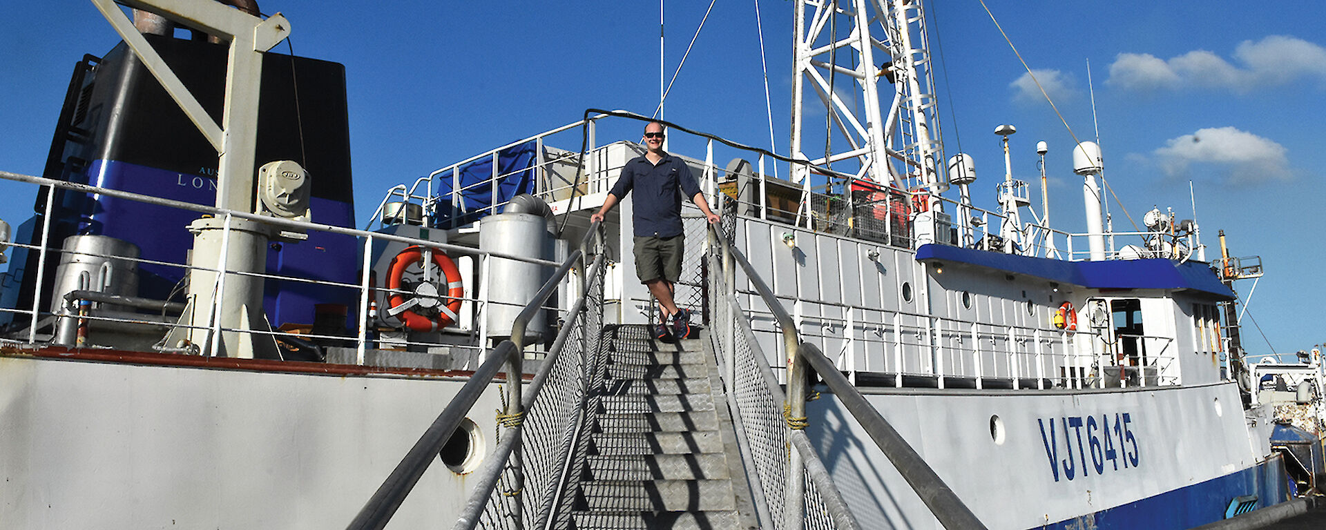 Dale Maschette at the top of the ramp of a fishing boat.
