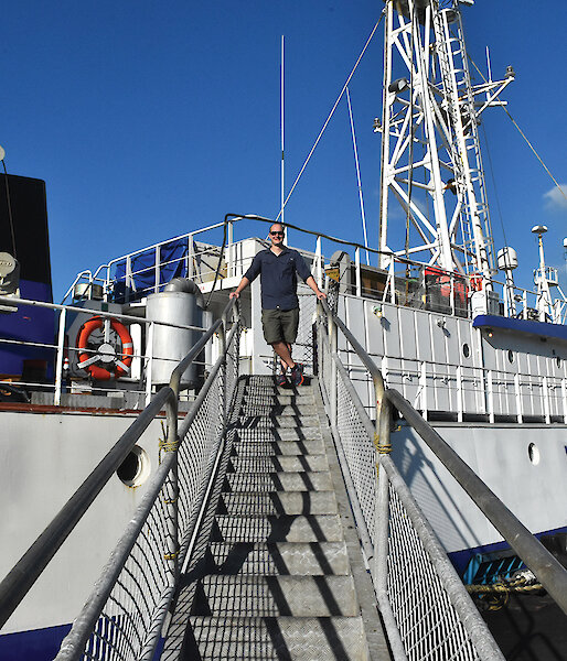 Dale Maschette at the top of the ramp of a fishing boat.