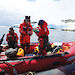 A group of researchers in a rubber boat off the coast of Casey.