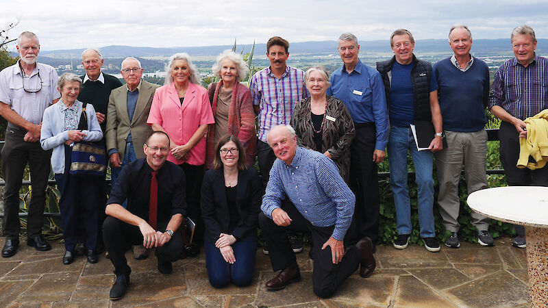 Geoscience Australia’s Antarctic field notebook citizen scientist transcribers and retired Antarctic geologists posing for a photo.
